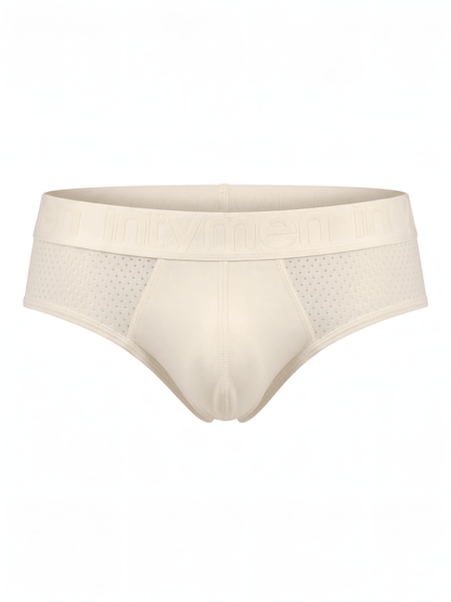 Brief masculino beige Intymen con paneles perforados sobre fondo blanco.
