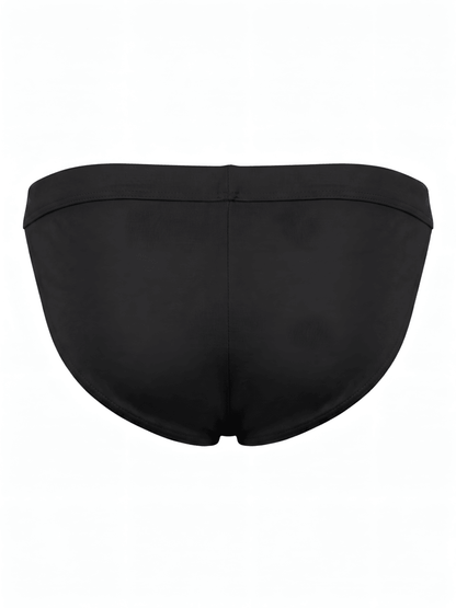 Tanga masculina negra Intymen vista posterior sobre fondo blanco.